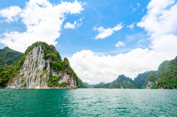 Wall Mural - landscape of clear water with rock mountain in ratchaprapa dam