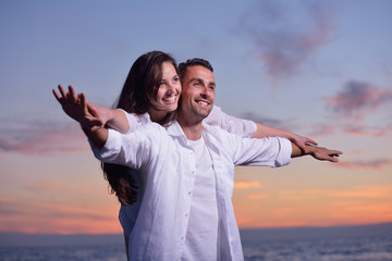 young couple  on beach have fun