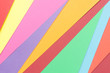 colorful construction paper arranged irregularly 