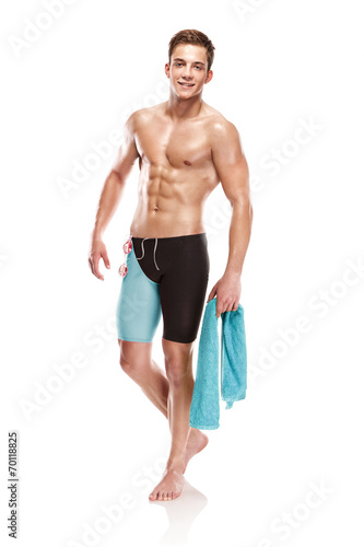 Fotografía Young attractive caucasian man swimmer with goggles and towel