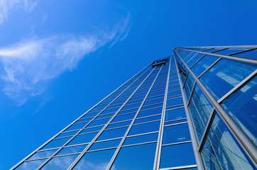 Stell blue skyscrapper's windows against clear blue sky