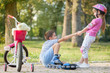 © V&P Photo Studio - little girl helps boy with roller skates to stand up