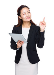 Wall Mural - Asian businesswoman hold tablet and finger point up