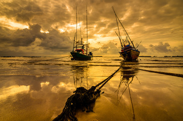 Wall Mural - Fishing sea boat and Sunrise