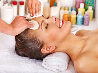 Woman getting  facial massage .