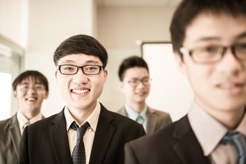 Wall Mural - Group of business people with businessman leader on foreground