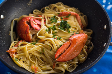 Pasta with american Lobster in pan