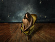 © Garrincha - girl with night fear sitting on armchair