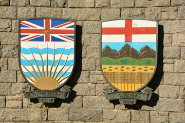 Wall Mural - Coats of arms of Canadian provinces displayed on wall