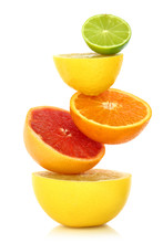 Fresh Citrus Fruit In A Row On White Background