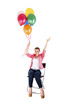 © Wisiel - woman with balloons over white background smiling