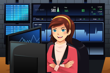 Stock trader in front of multiple monitors