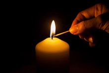 Hand With Matchstick, Lighting A Candle