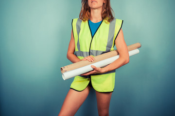 Wall Mural - Sexy female engineer with plans