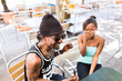 © Kzenon - African couple having fun in cafe