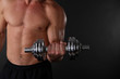 © Africa Studio - Muscle young sportsman execute exercise with dumbbell