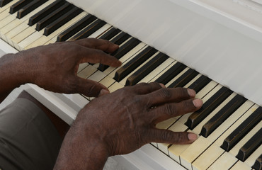 Senior man Plays Piano