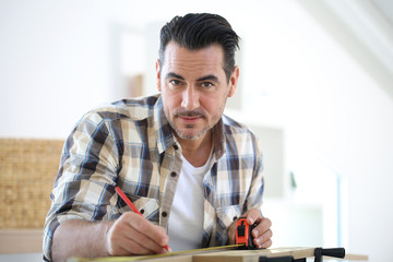 Wall Mural - Portrait of man doing renovation work at home