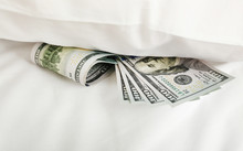 Hidden Money Under Pillow Close Up