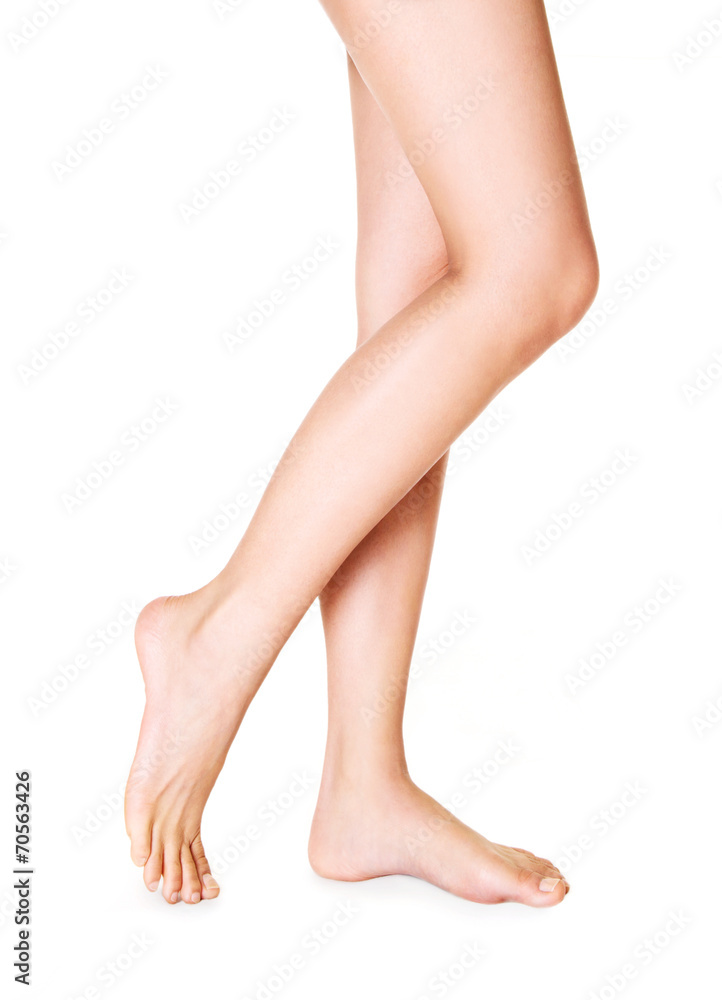 Beautiful woman legs isolated on white. - obrazy, fototapety, plakaty 