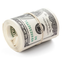 Hundred Dollar Bills Rolled Up With Rubberband. Clipping Path..