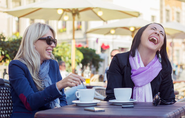 Two female friends having goot time together