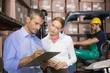 © WavebreakmediaMicro - Warehouse team working together with clipboard
