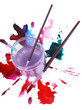 Brushes in glass jar with water and spilled paints isolated