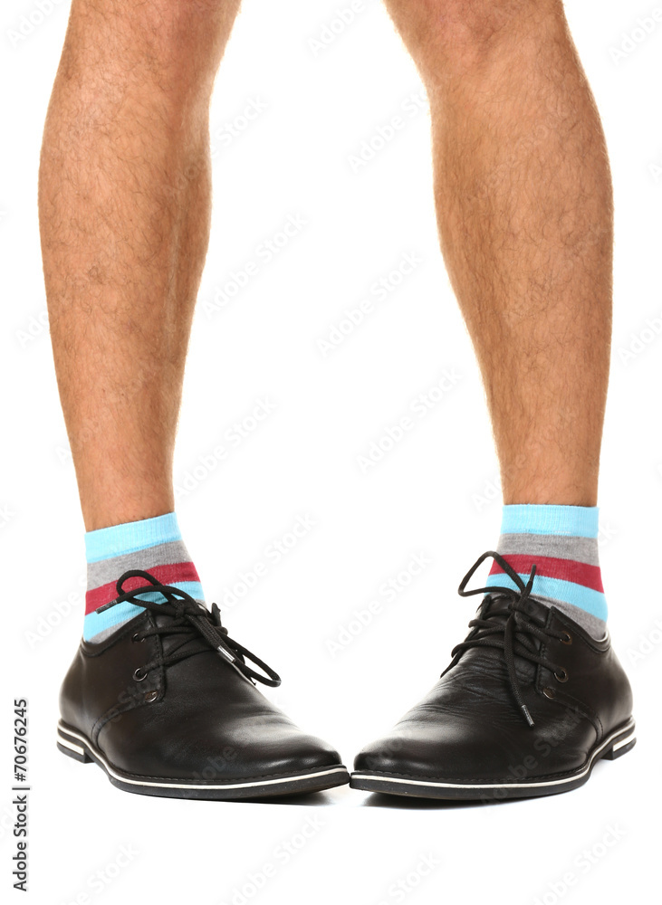 Man leg in suit and colorful socks, isolated on white