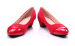 Womens red shoes on a white background