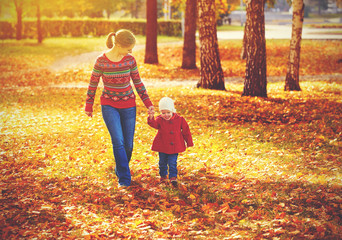 Poster - happy family mother and child little daughter on autumn walk