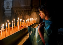 The Pilgrims Lit Candles At The Church Of The Holy Sepulchre In