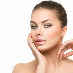 Wall Mural - young woman with clean fresh skin isolated on white