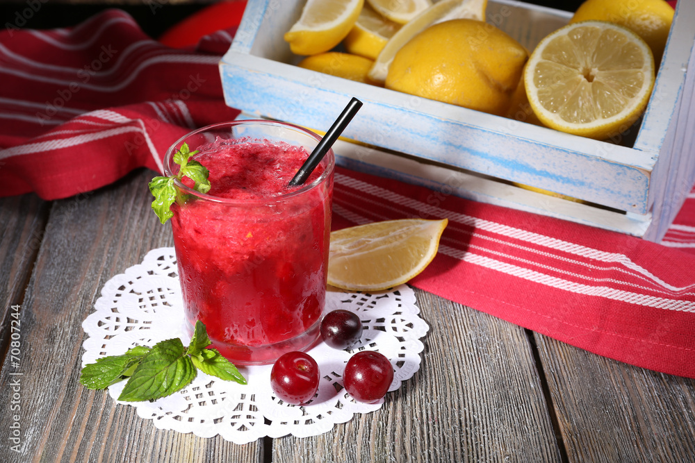 Fresh cold cherry cocktail with mint and lemon