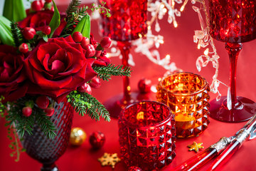 Wall Mural - Christmas table decoration with flowers and candles