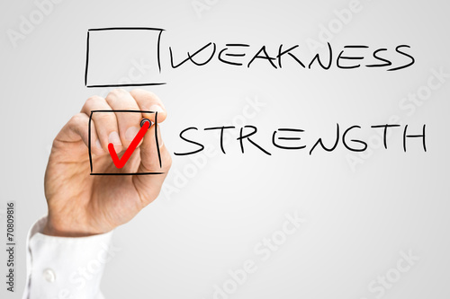 Fotografía Hand Checking Box Next to the Word Strength