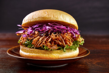 Wall Mural - Pulled pork burger with red cabbage salad on plate