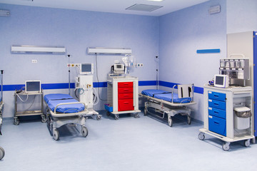 hospital room with medical equipment and scanners