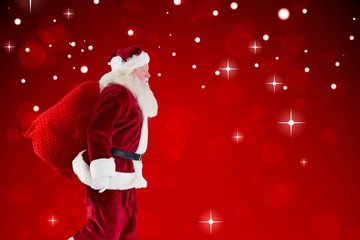 Aufkleber - Composite image of santa claus carrying sack
