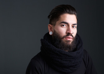 Cool guy with beard and piercings