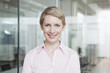 © Westend61 - Germany, Munich, Businesswoman in office