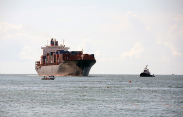 Wall Mural - Heavy cargo ship approaching