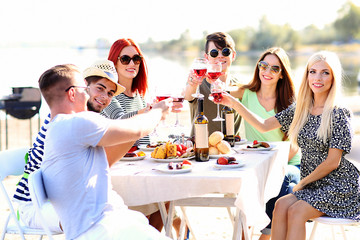 Wall Mural - Happy friends on rest at beach