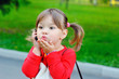 © timonko - Little girl speak on the phone