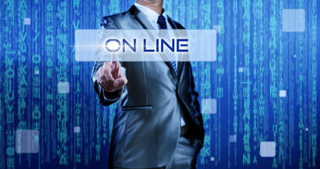 Wall Mural - Business man with digital background pressing on button on line