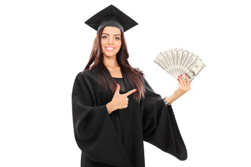 Canvas Print - Female graduate student holding money