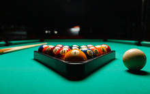 Billiard Balls In A Pool Table.