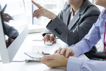 Canvas Print - Woman pointing a finger on the screen of the personal computer