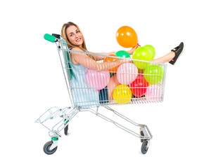 blonde pretty girl inside supermarket cart