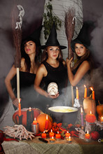 Three Witch With A Skull
